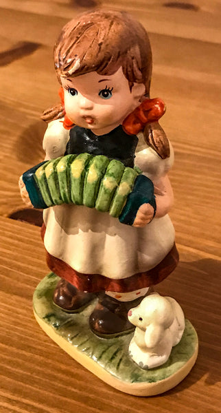 Little Girl with Concertina Pottery Figurine - TheReedLounge.com